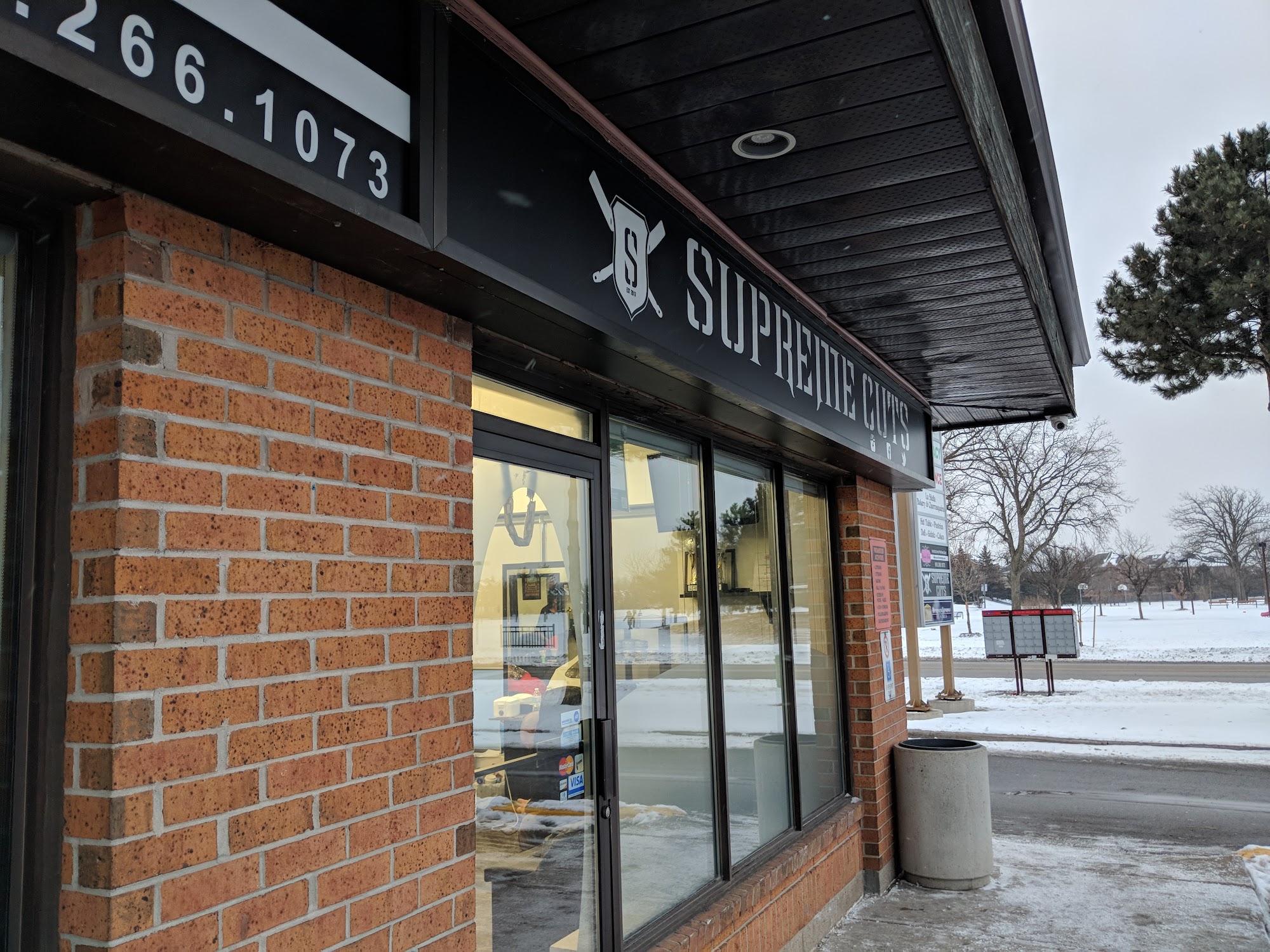 Supreme Cuts barbershop exterior at 270 Chancellor Drive, Woodbridge