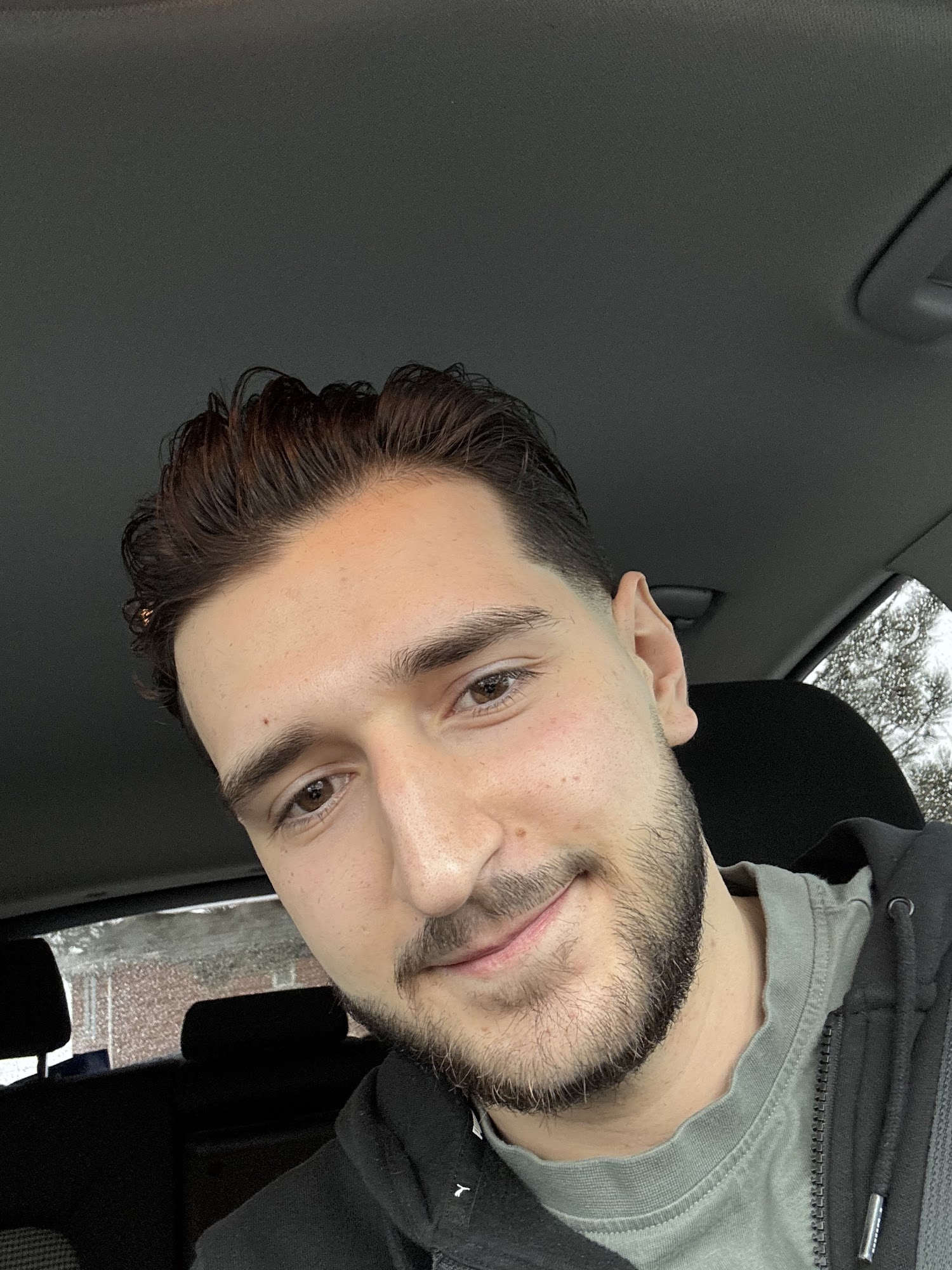 Textured quiff with skin fade, haircut result at Supreme Cuts Woodbridge